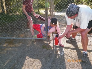 Virgin Wendy wiggling her way through the fence